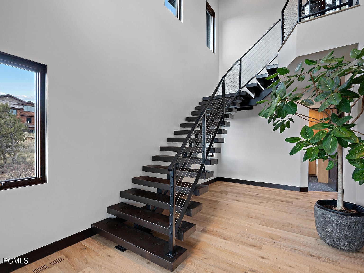 Floating steel-and-wood staircase