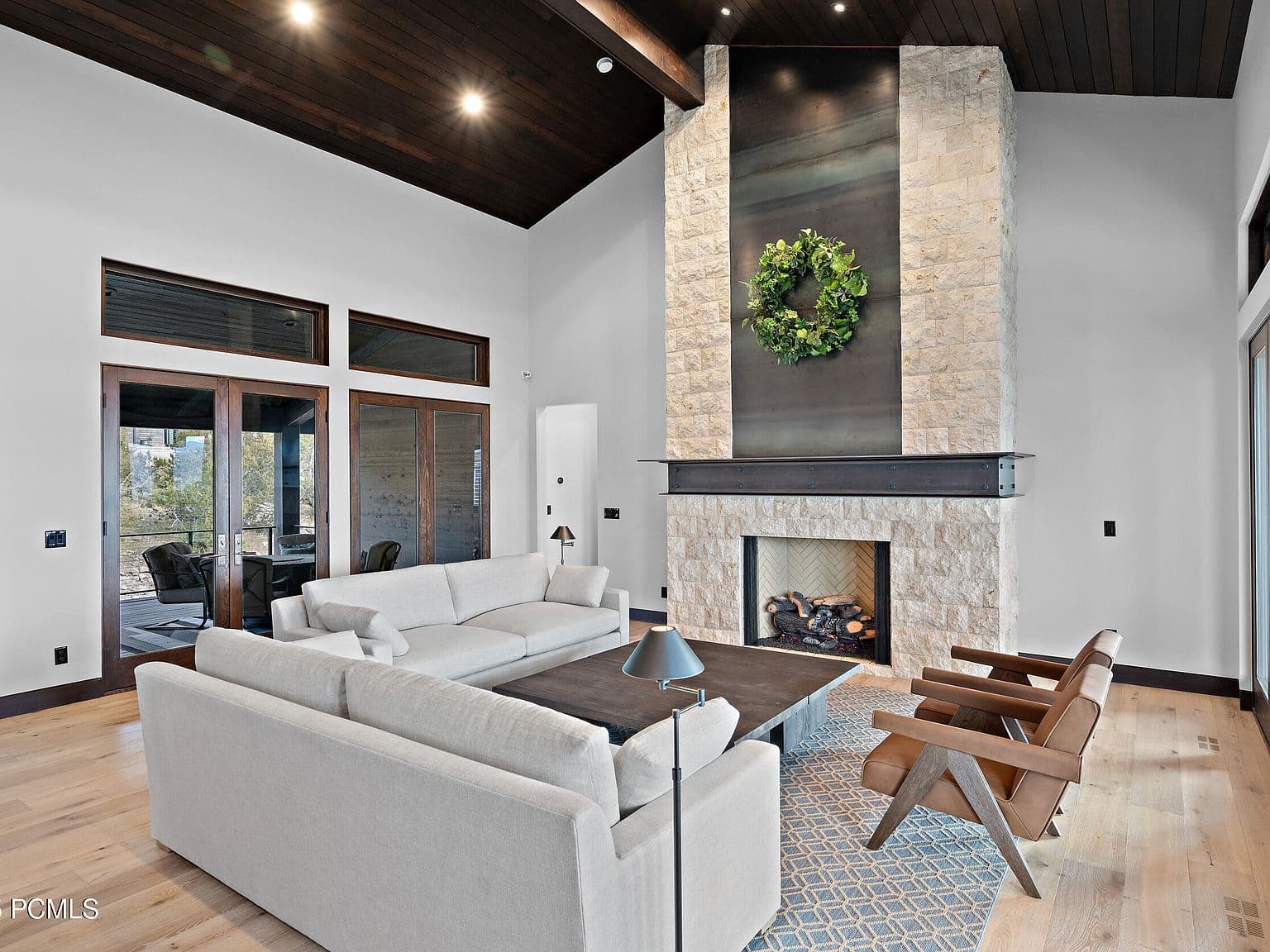 Great room with steel-and-stone fireplace